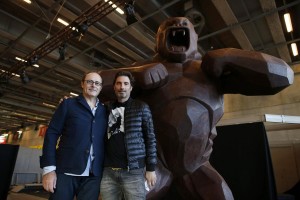 French chocolate maker Jean-Paul Hevin and Richard Orlinski pose next to their four-metre tall chocolate King-Kong in Paris